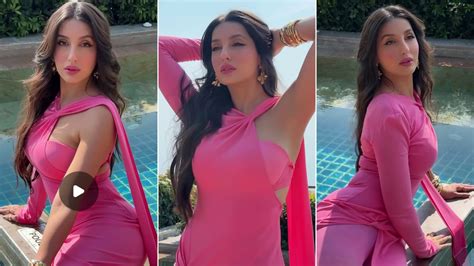 nora sexy pic|Photos: Nora Fatehi raises temperature in nude thigh。